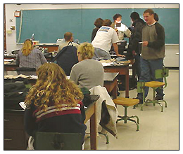 Biology students preparing slides -- photography by Hollie Miller